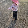 Karter is registered to the contest to win money with this photo: child, cowboy_hat, pink_hat, shirt, jeans, gravel_path, shadow, walking, outdoor, sunlight, back_view, young_child, patterned_shirt, casual_clothing, daytime, nature, footwear, small_person, hat, scenic