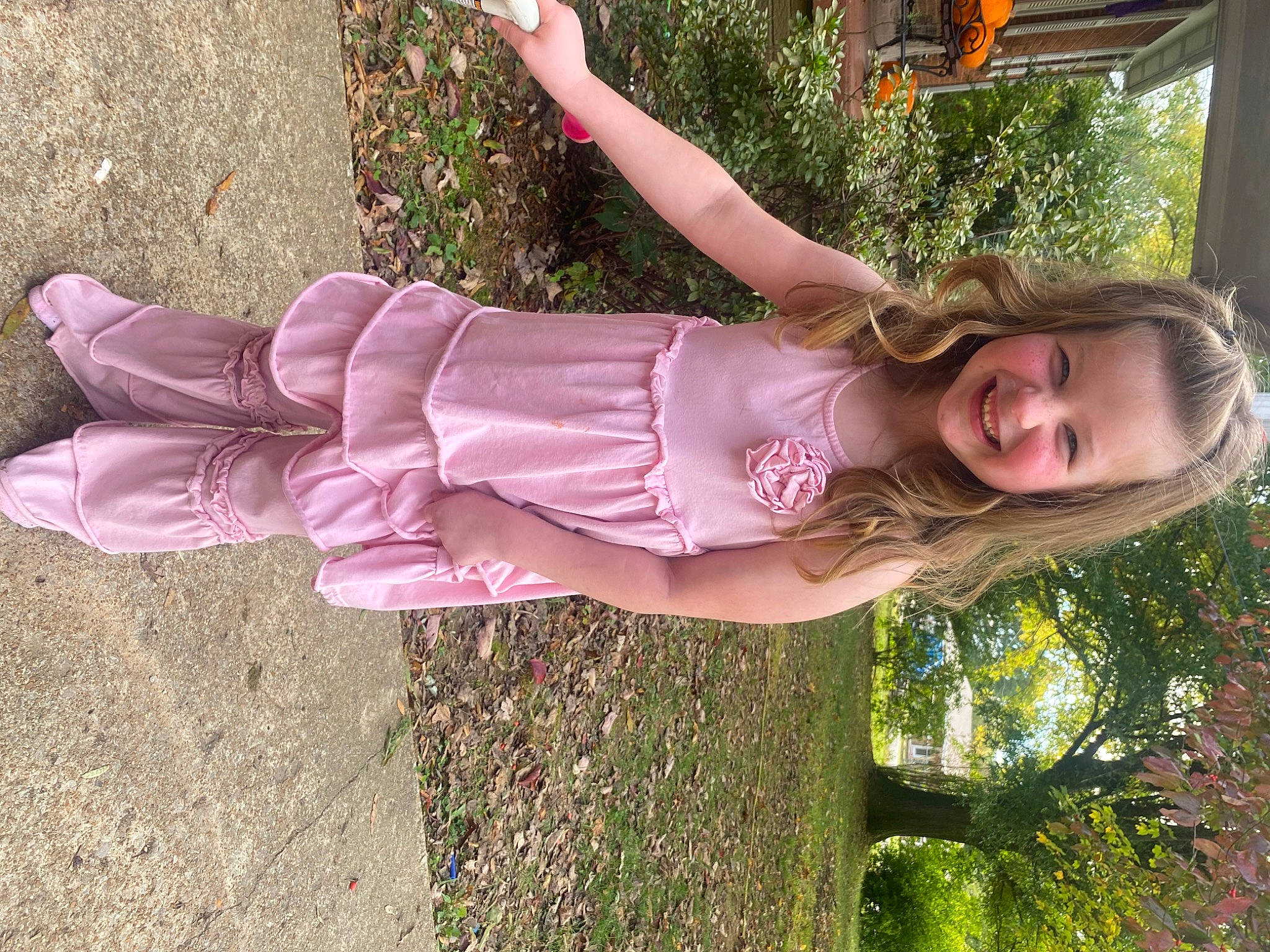 Makennah is registered to the contest to win money with this photo: child, fun, garden, grass, green, happy, human_leg, joy, leisure, magenta, people_in_nature, person, pink, plant, recreation, smile, soil, spring, sunlight, thigh