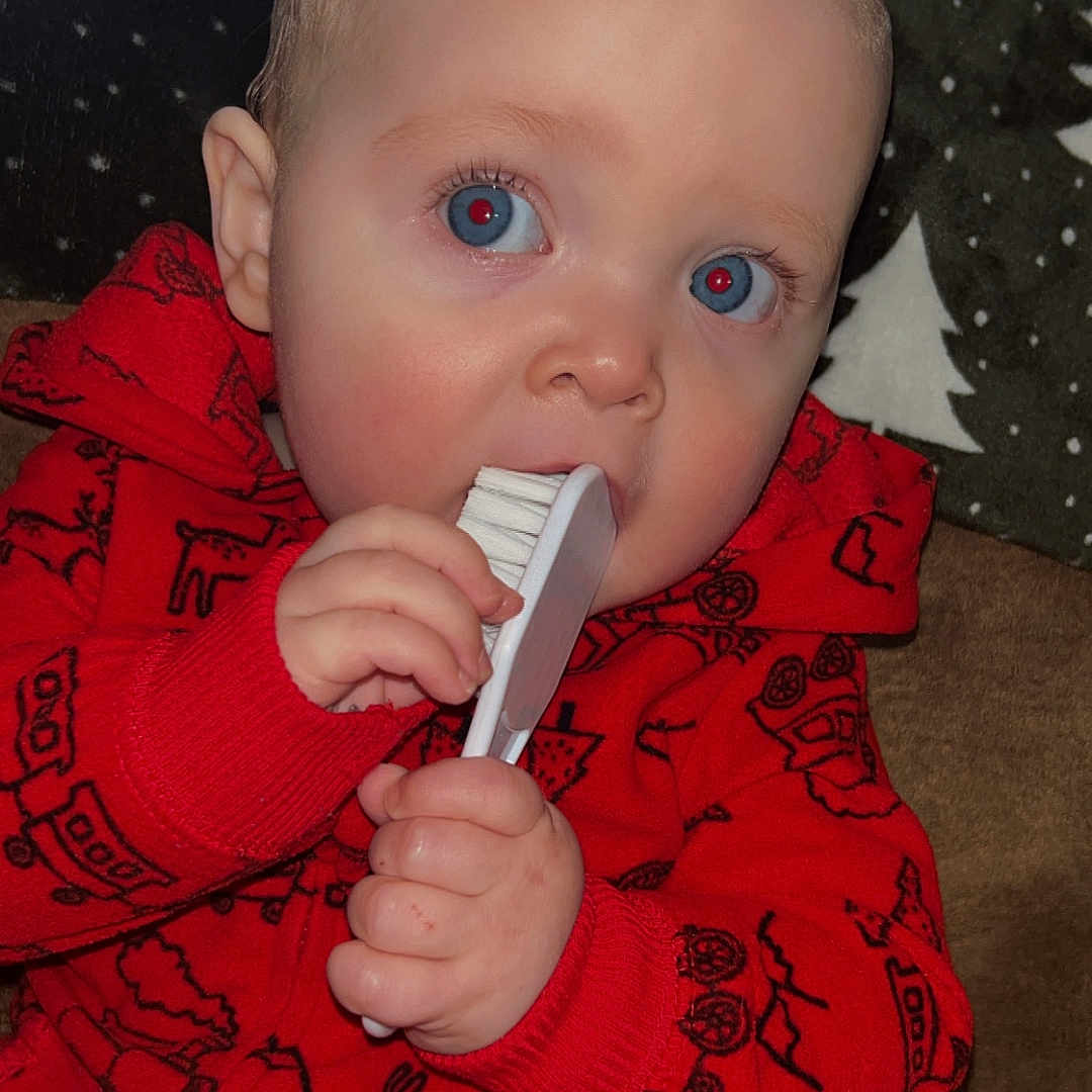 Aldon joined the competition — help win amazing prizes! baby, bodypart, brush, clothing, couch, cutlery, device, face, finger, furniture, hand, head, knitwear, person, photography, portrait, spoon, sweater, tool, toothbrush