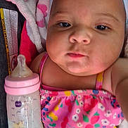 Shalyssa joined the competition — help win amazing prizes! baby, babycare, blanket, bottle, child, closeup, clothing, cute, face, feeding, floral, headwear, indoor, infant, person, pink, portrait, skin, swimsuit, toddler