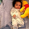 Ahsai joined the competition — help win amazing prizes! baby, bed, blanket, child, cozy, curly_hair, cute, footed_pajamas, hand, indoor, infant, lying_down, onesie, patterned, plush_toy, portrait, smiling, soft_toy, toddler, winnie_the_pooh