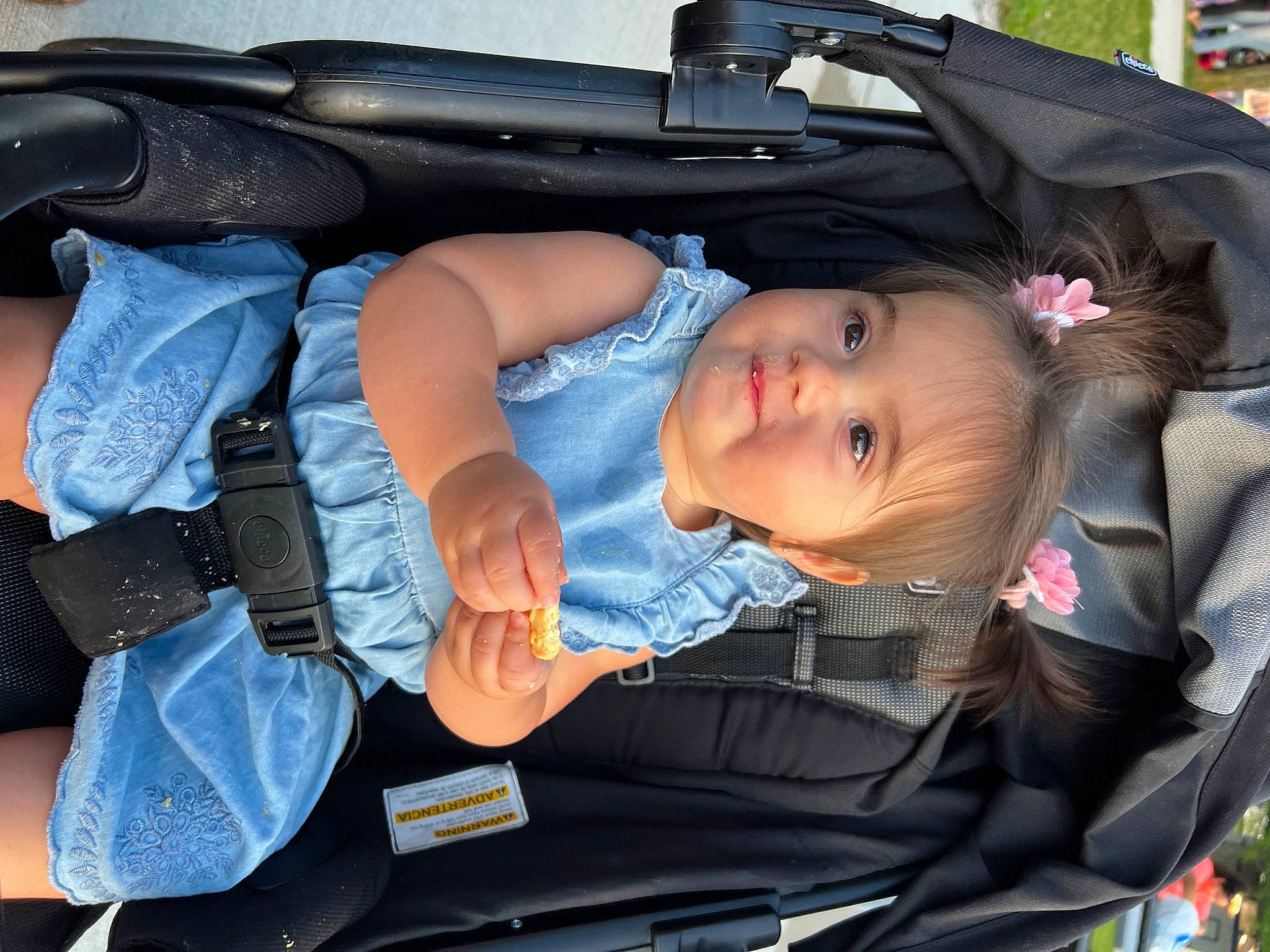 Amiyah is registered to the contest to win money with this photo: auto_part, automotive_design, automotive_exterior, baby, baby_carriage, baby_products, car, car_seat, child, comfort, electric_blue, family_car, fun, joy, luxury_vehicle, motor_vehicle, person, smile, toddler, tree