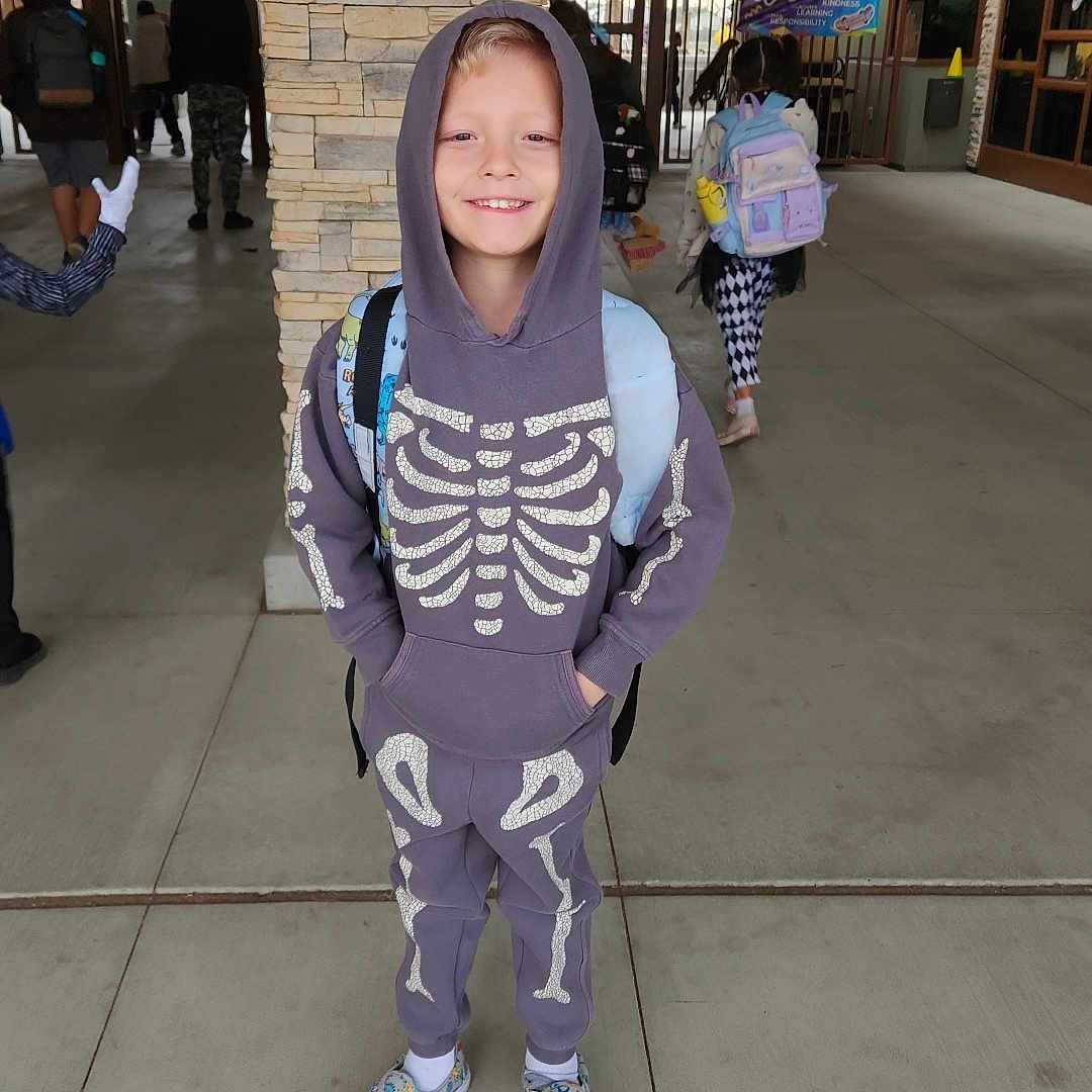 Boomer joined the competition — help win amazing prizes! adult, child, clothing, face, female, footwear, girl, hood, hoodie, knitwear, longsleeve, male, man, pants, person, shoe, sleeve, sweater, sweatshirt, wood