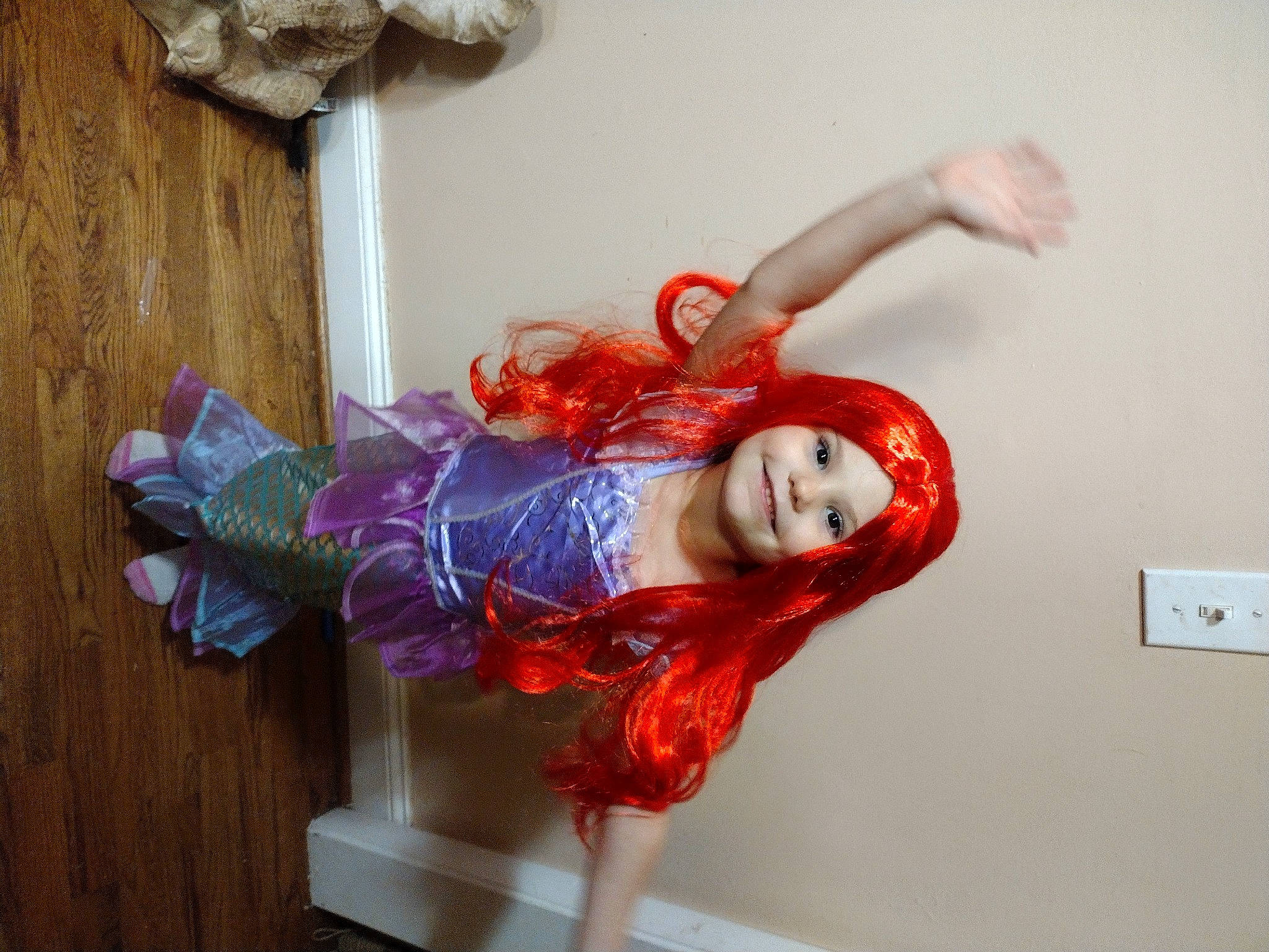 Maggie is registered to the contest to win money with this photo: bangs, brown_hair, carmine, dress, fashion_accessory, fashion_design, hair_coloring, happy, headwear, hime_cut, human_leg, jewellery, joy, long_hair, magenta, person, red_hair, smile, thigh, toy