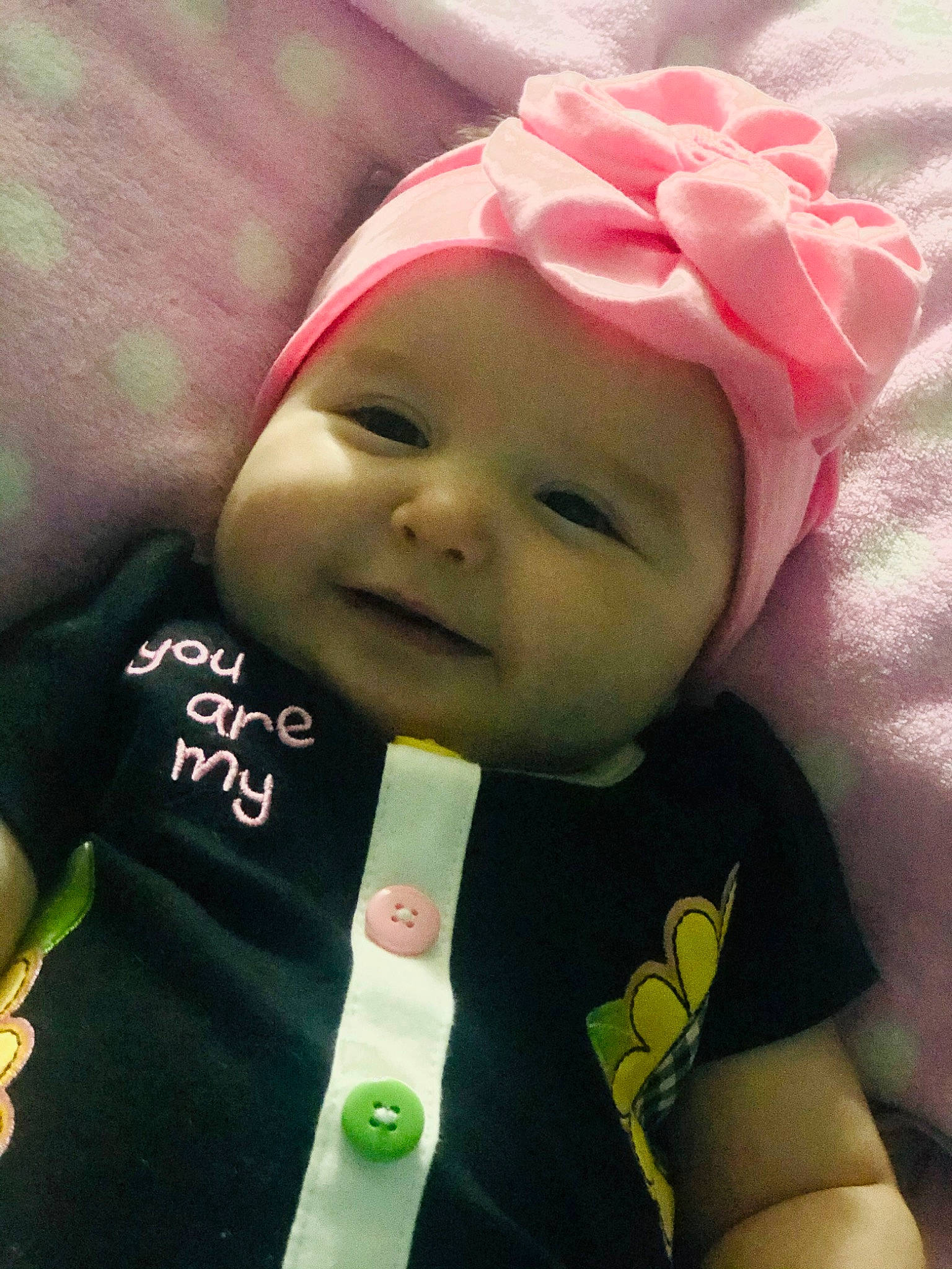 Emilee is registered to the contest to win money with this photo: baby, baby_products, cheek, child, cool, face, hair_accessory, happy, head, headgear, headwear, lip, nose, person, pink, product, skin, toddler