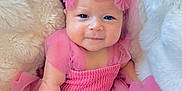 Adalynn joined the competition — help win amazing prizes! baby, infant, pink_dress, headband, flower, blue_eyes, smile, soft_blanket, fur_texture, cute, portrait, child, tulle, fabric, newborn, lying_down, adorable, closeup, skin, baby_girl