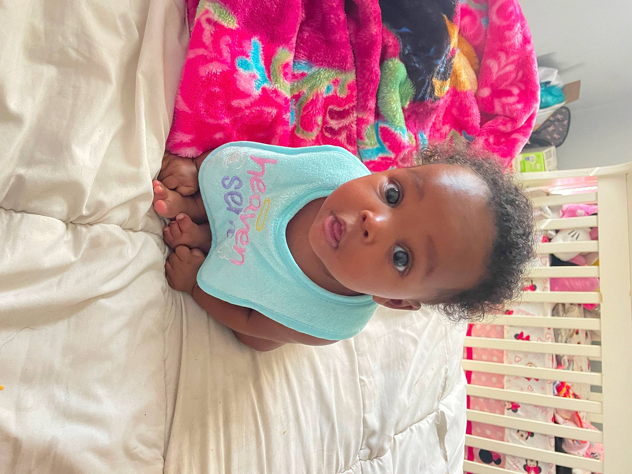 Camilla is registered to the contest to win money with this photo: baby, baby_toddler_clothing, child, comfort, eye, fun, happy, head, linens, magenta, pattern, person, pink, play, red, room, skin, sleeve, smile, toddler