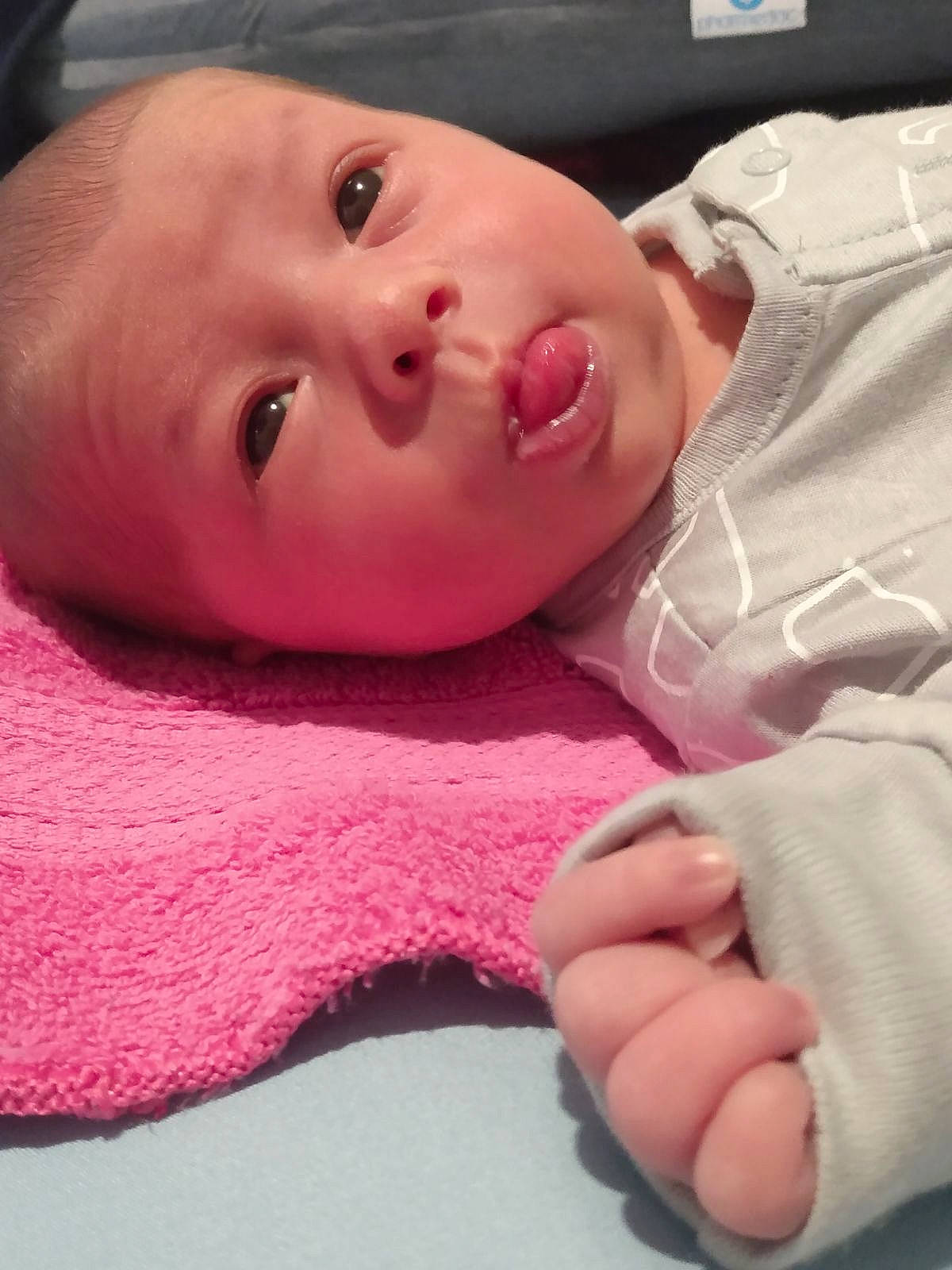 Elizabeth is registered to the contest to win money with this photo: baby, baby_toddler_clothing, cheek, child, chin, comfort, eye, eyebrow, eyelash, finger, gesture, headgear, lip, mouth, nose, person, pink, skin, sleeve, thumb