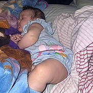 Raelynn is registered to the contest to win money with this photo: baby, sleeping, blanket, bed, clothing, cute, infant, child, soft, comfort, rest, peaceful, cozy, pajamas, cute_outfit, toddler, portrait, indoor, skin, face