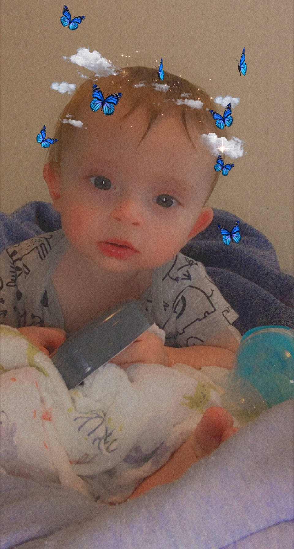 Atticus is registered to the contest to win money with this photo: arm, baby, baby_toddler_clothing, blue, cheek, chin, eye, eyebrow, face, finger, head, headgear, iris, lip, people, person, pink, product, skin, textile