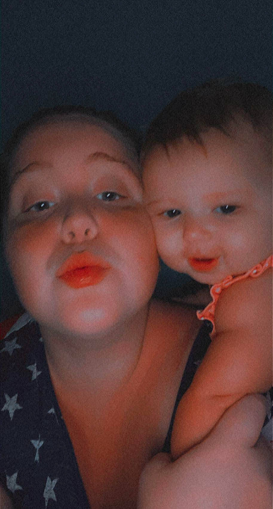 Emily is registered to the contest to win money with this photo: baby, black_hair, cheek, chin, eye, eyebrow, eyelash, finger, flash_photography, forehead, fun, gesture, happy, iris, lip, mouth, neck, nose, person, skin