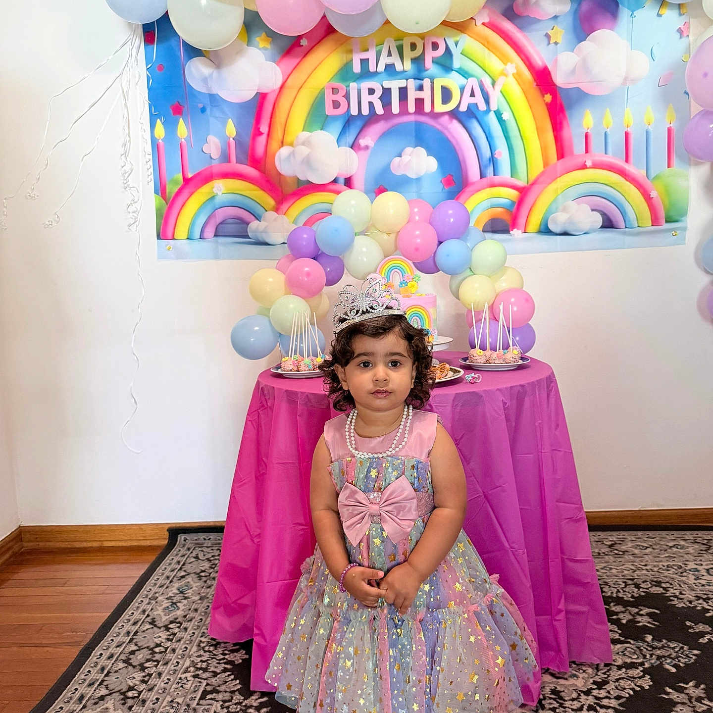 Pravya joined the competition — help win amazing prizes! child, birthday, party, balloons, rainbow, tiara, dress, pearls, table, cake, pink, pastel_colors, celebration, floor_rug, indoor, decorations, shoes, curly_hair, young_girl, festive