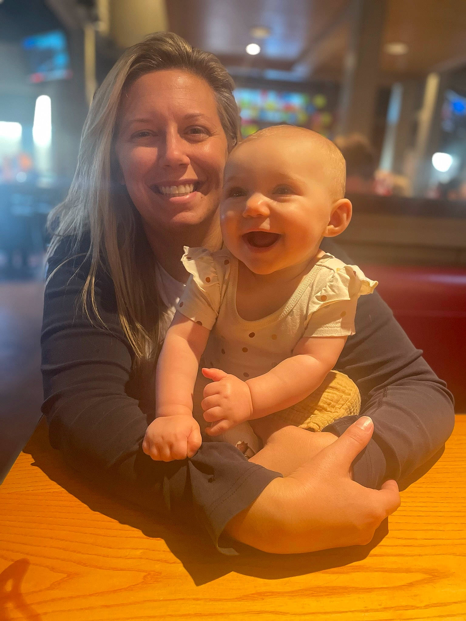 Annaka is registered to the contest to win money with this photo: arm, baby, cheek, facial_expression, finger, flooring, fun, gesture, hairstyle, hand, happy, human, interaction, joy, leisure, people, person, skin, smile, standing