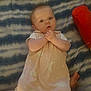 Paisley joined the competition — help win amazing prizes! baby, blanket, child, clothing, comfort, cute, expression, face, foot, hand, indoors, infant, laying, newborn, pattern, person, sleep_sack, sock, soft, striped
