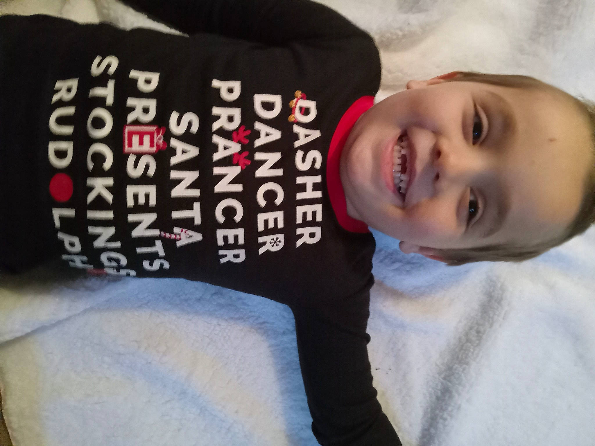 Bentley is registered to the contest to win money with this photo: black_hair, cheek, child, cool, elbow, eye, face, flash_photography, font, happy, hat, headgear, joy, laugh, lip, neck, person, portrait_photography, sleeve, smile