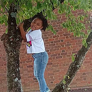 Embher Marie Hunt joined the competition — help win amazing prizes! app_icons, brick_wall, camera_app, child, chrome, climbing, green_leaves, happy, jeans, messages, nature, notification, outdoor, person, phone_app, phone_screenshot, prime_video, smiling, tree, white_tshirt