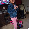 Embher Marie Hunt joined the competition — help win amazing prizes! cable, casual, child, clothing, denim_jacket, floor, furniture, heater, indoor, mirror, person, pink_leggings, playset, pose, room, sneakers, television, tile_floor, toy_car, young_girl