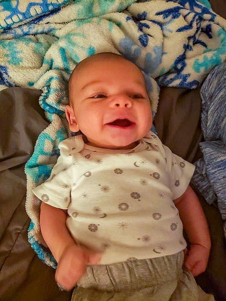 Aden is registered to the contest to win money with this photo: baby, cheek, child, face, head, person, skin, smile, toddler