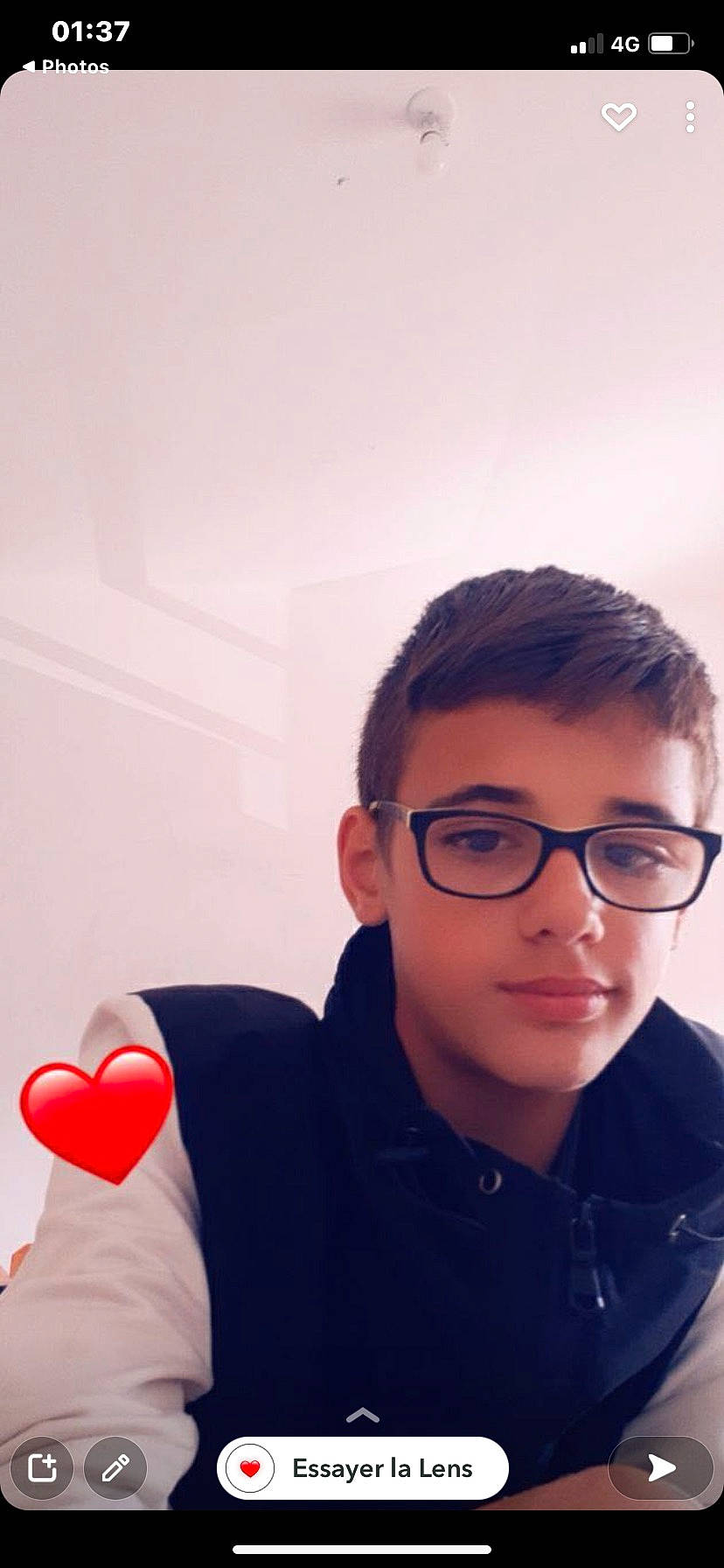 Erwan participe au concours pour gagner de l'argent avec cette photo : audio_equipment, black_hair, child, ear, electric_blue, eyelash, eyewear, forehead, fun, gesture, glasses, happy, jacket, jaw, lip, mouth, neck, person, selfie, shoulder