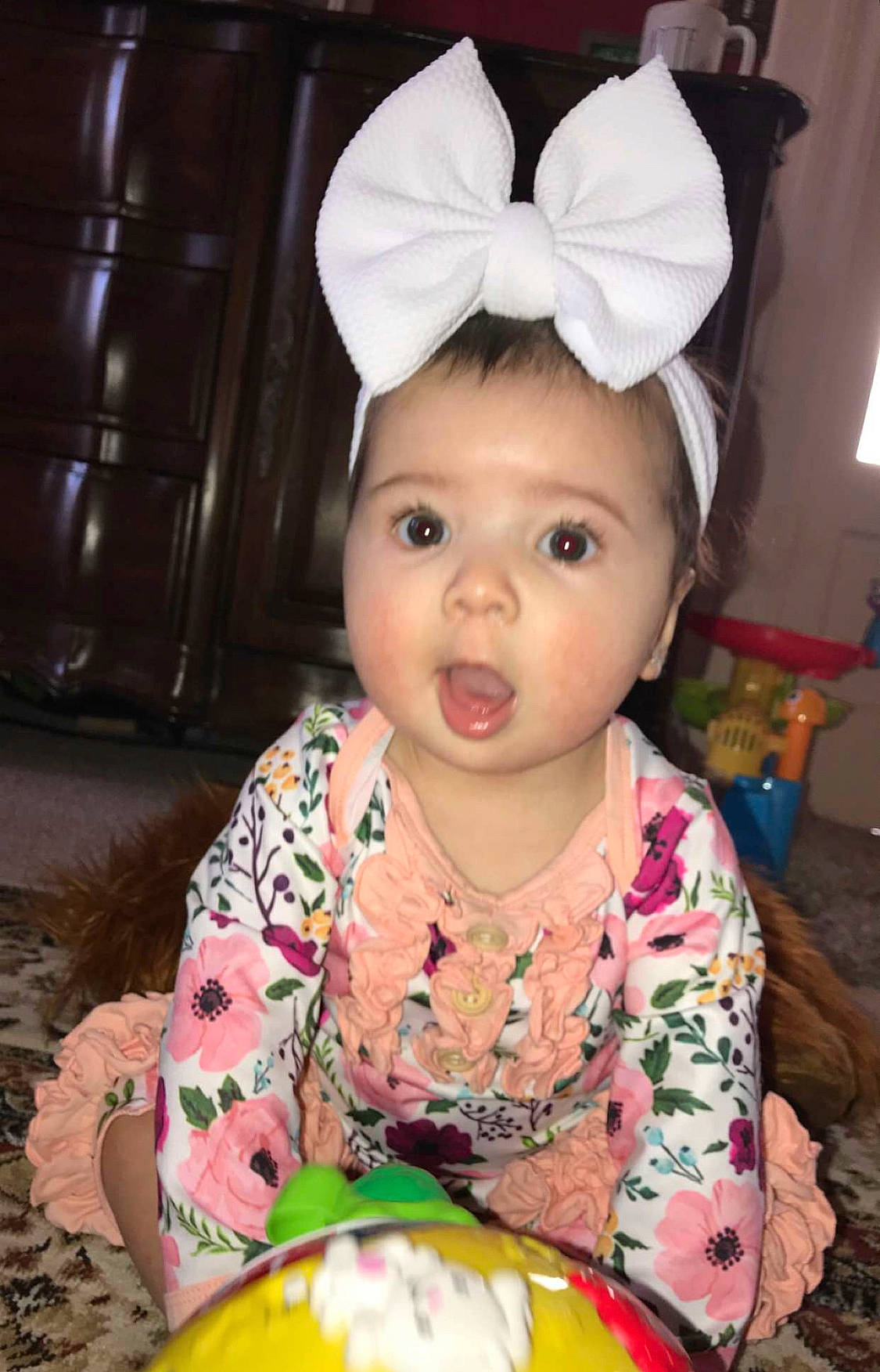 Maddisyn is registered to the contest to win money with this photo: baby, baby_toddler_clothing, beauty, chair, cheek, child, event, eye, face, facial_expression, fun, hairstyle, happy, head, nose, organ, outerwear, people, person, pink