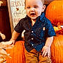 Kallen is registered to the contest to win money with this photo: toddler, child, pumpkin, autumn, fall, harvest, orange, smiling, happy, clothing, shirt, pants, indoor, decor, sign, wood, festival, seasonal, cute, celebration
