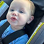 Kallen joined the competition — help win amazing prizes! baby, blue_eyes, car_seat, child, cute, face, hair_curl, infant, indoors, person, seat_belt, safety, smile, straps, toddler, transportation, clothing, blanket, warning_label, closeup