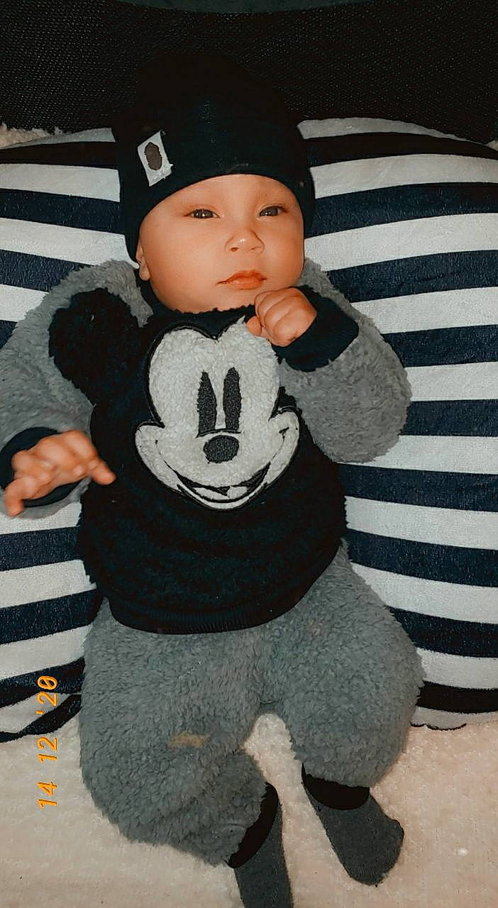 Avion joined the competition — help win amazing prizes! baby, baby_products, baby_toddler_clothing, beanie, bonnet, costume_accessory, craft, finger, headwear, human, linens, long_sleeved_t_shirt, person, sleeve, sweater, textile, thumb, toddler, wool, woolen