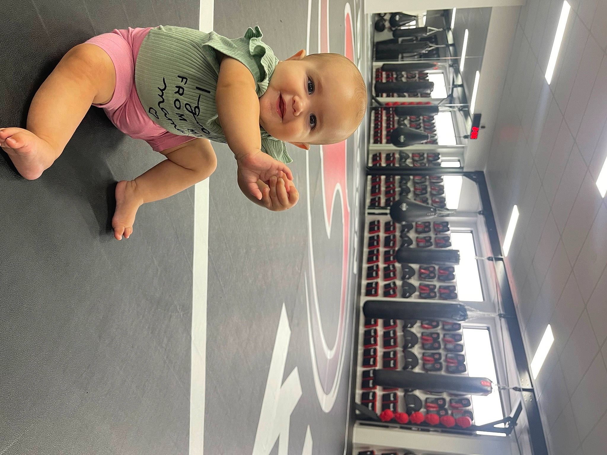 Haizel joined the competition — help win amazing prizes! abdomen, baby, chest, child, elbow, flooring, fun, human_leg, joy, knee, machine, person, physical_fitness, room, shorts, shoulder, smile, sportswear, t_shirt, thigh