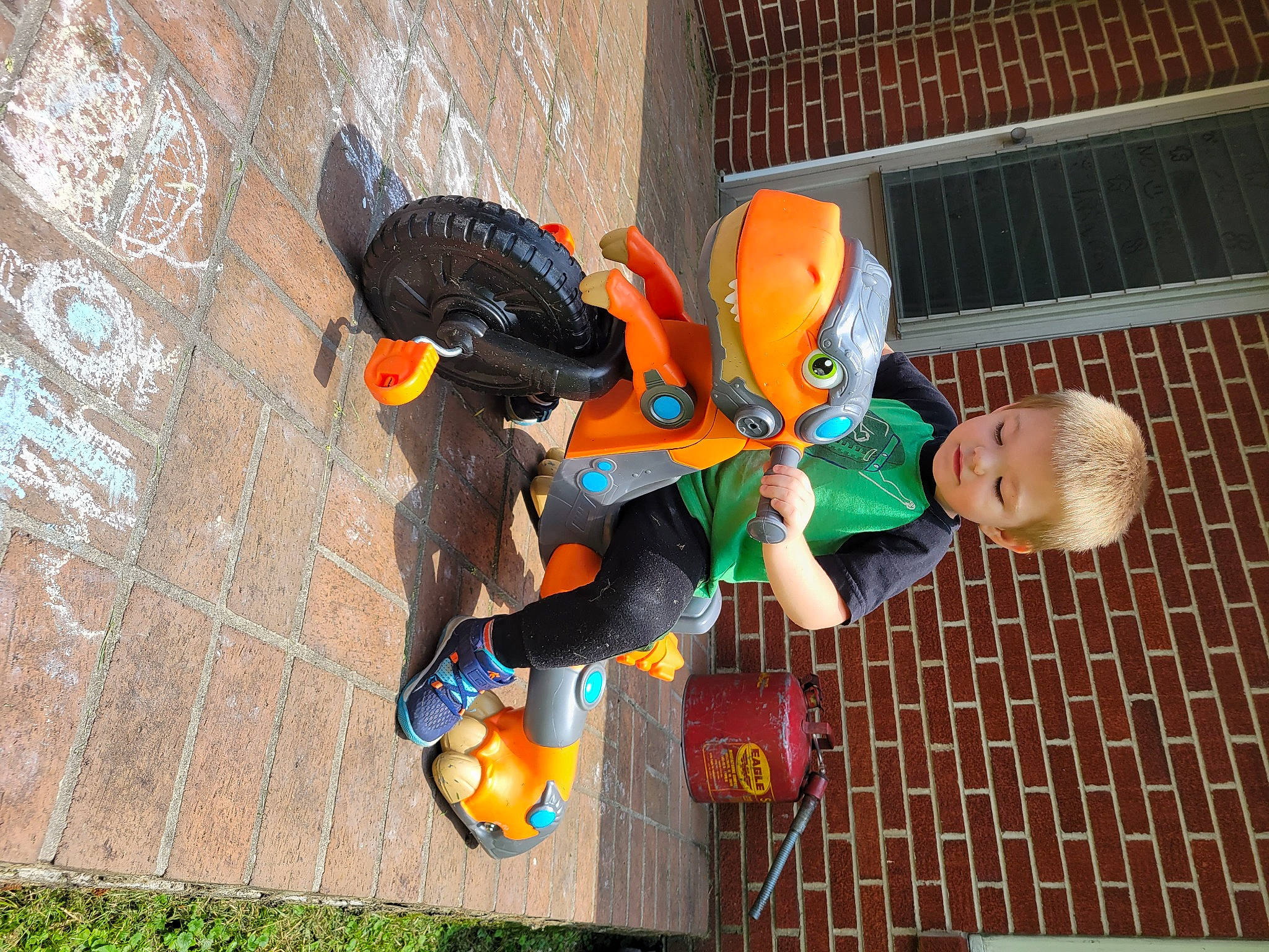 Dezmond is registered to the contest to win money with this photo: art, child, concrete, fun, helmet, leisure, orange, person, personal_protective_equipment, play, recreation, toddler, visual_arts, world