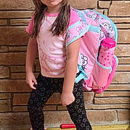Ma'Kinzie joined the competition — help win amazing prizes! child, girl, portrait, standing, backpack, school, pink, bows, long_hair, brick_wall, wood_floor, sneakers, leggings, star_pattern, fashion, pouting, indoor, full_body, colorful, school_supplies