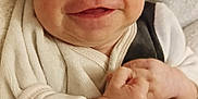 Tyana participe au concours pour gagner de l'argent avec cette photo : baby, blanket, child, closeup, clothing, cozy, cute, face, hands, happy, indoors, infant, newborn, person, portrait, skin, smile, soft, warm, young