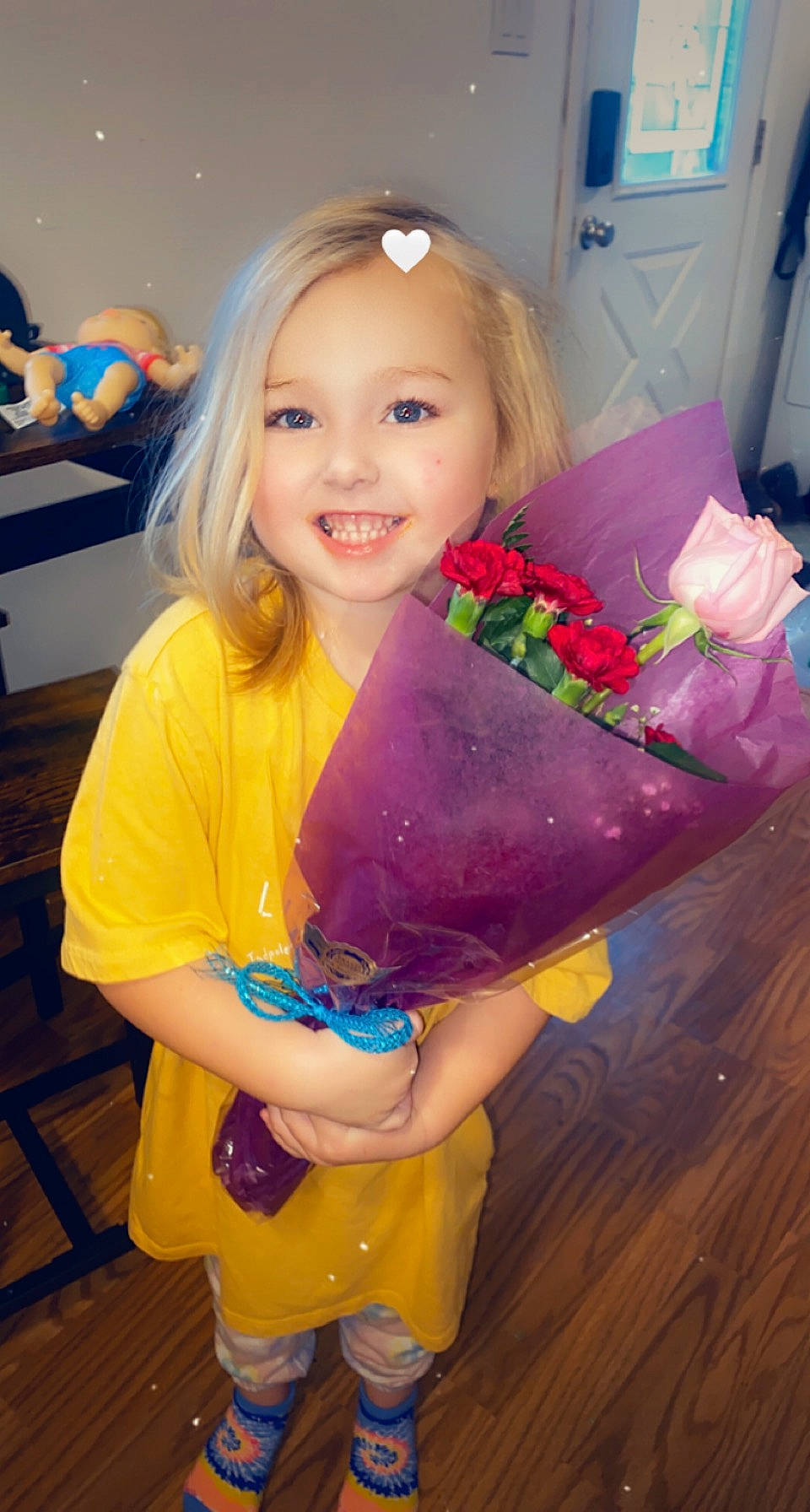 Sienna is registered to the contest to win money with this photo: baby_toddler_clothing, blue, child, electric_blue, event, facial_expression, fun, happy, iris, joy, magenta, person, petal, pink, play, purple, room, sitting, skin, smile