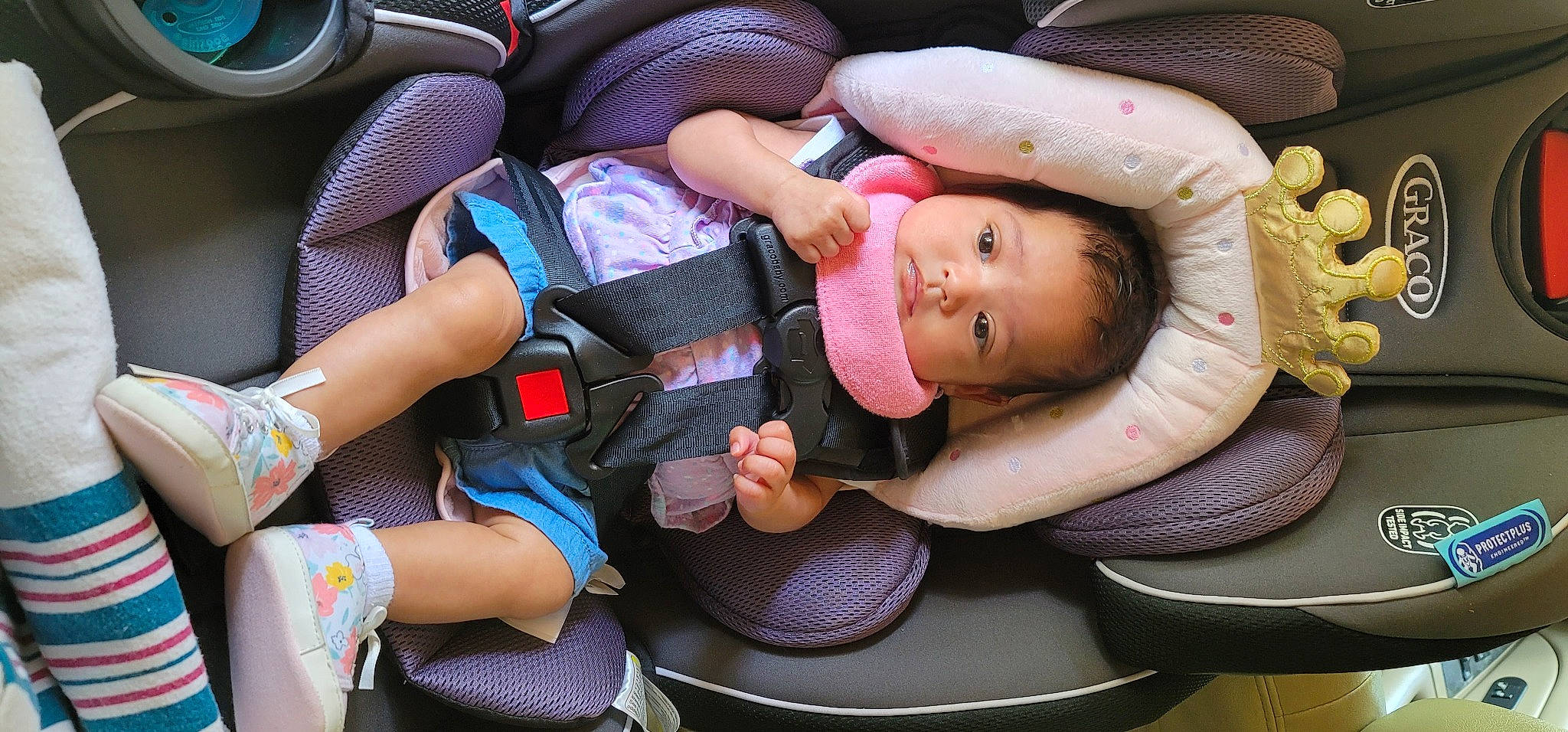 Naomi joined the competition — help win amazing prizes! auto_part, baby, baby_carriage, baby_products, baby_toddler_clothing, cap, car_seat, comfort, fashion_accessory, finger, fun, happy, hat, headgear, nail, person, pink, sitting, thumb, toddler