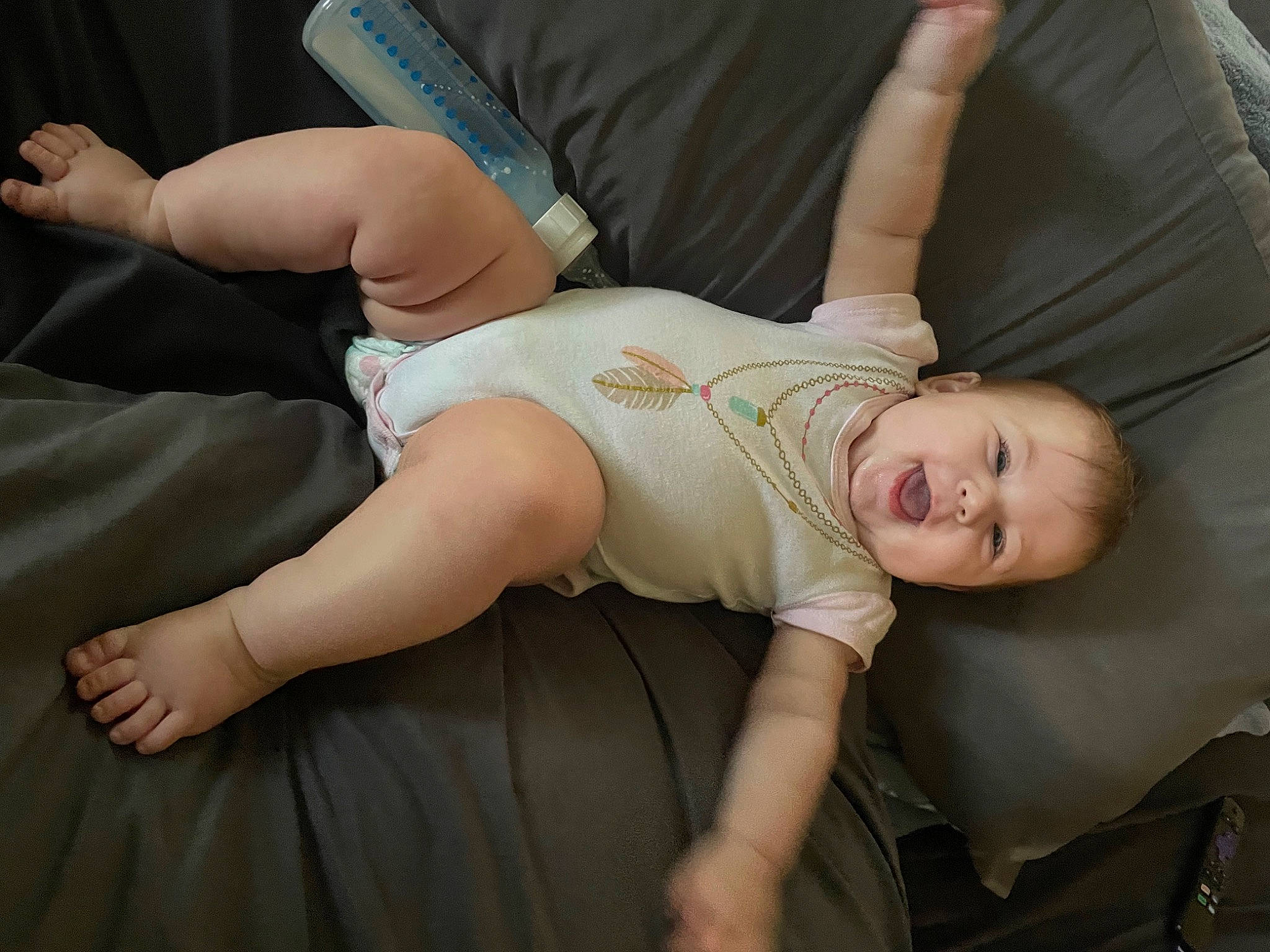 Analeigh is registered to the contest to win money with this photo: baby, chair, comfort, couch, elbow, eye, finger, flash_photography, gesture, glasses, hair, human_body, joint, knee, leg, person, shoulder, skin, stomach, thigh