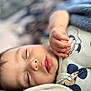 Nathan joined the competition — help win amazing prizes! baby, sleeping, hand, face, blanket, clothing, mickey_mouse, child, cozy, soft, peaceful, cute, portrait, indoor, toddler, rest, closeup, infant, bed, relaxation