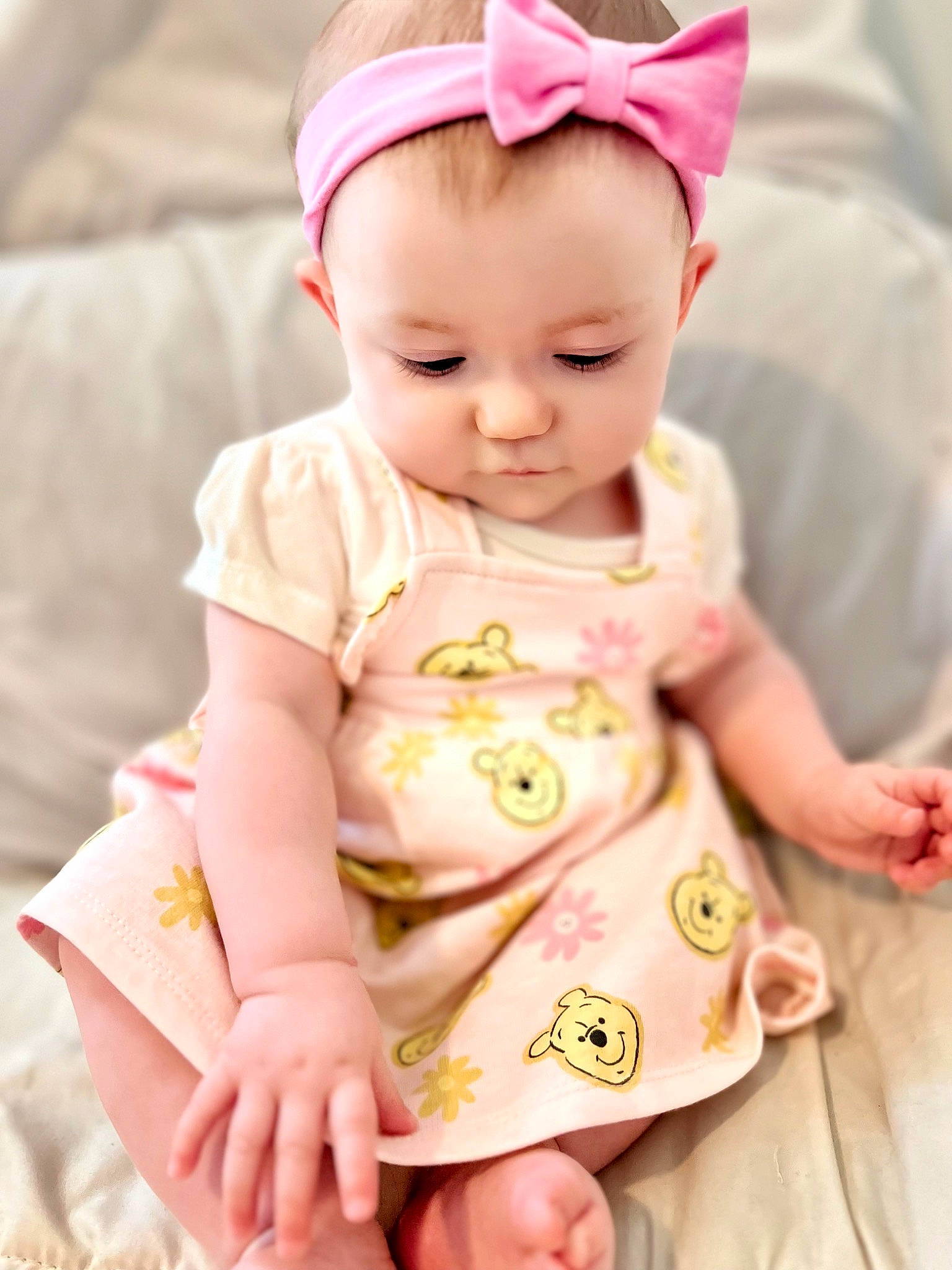 Charleigh is registered to the contest to win money with this photo: baby, baby_toddler_clothing, cap, cheek, child, dress, eye, fashion_accessory, happy, head, magenta, pattern, peach, person, pink, product, skin, sleeve, textile, toddler