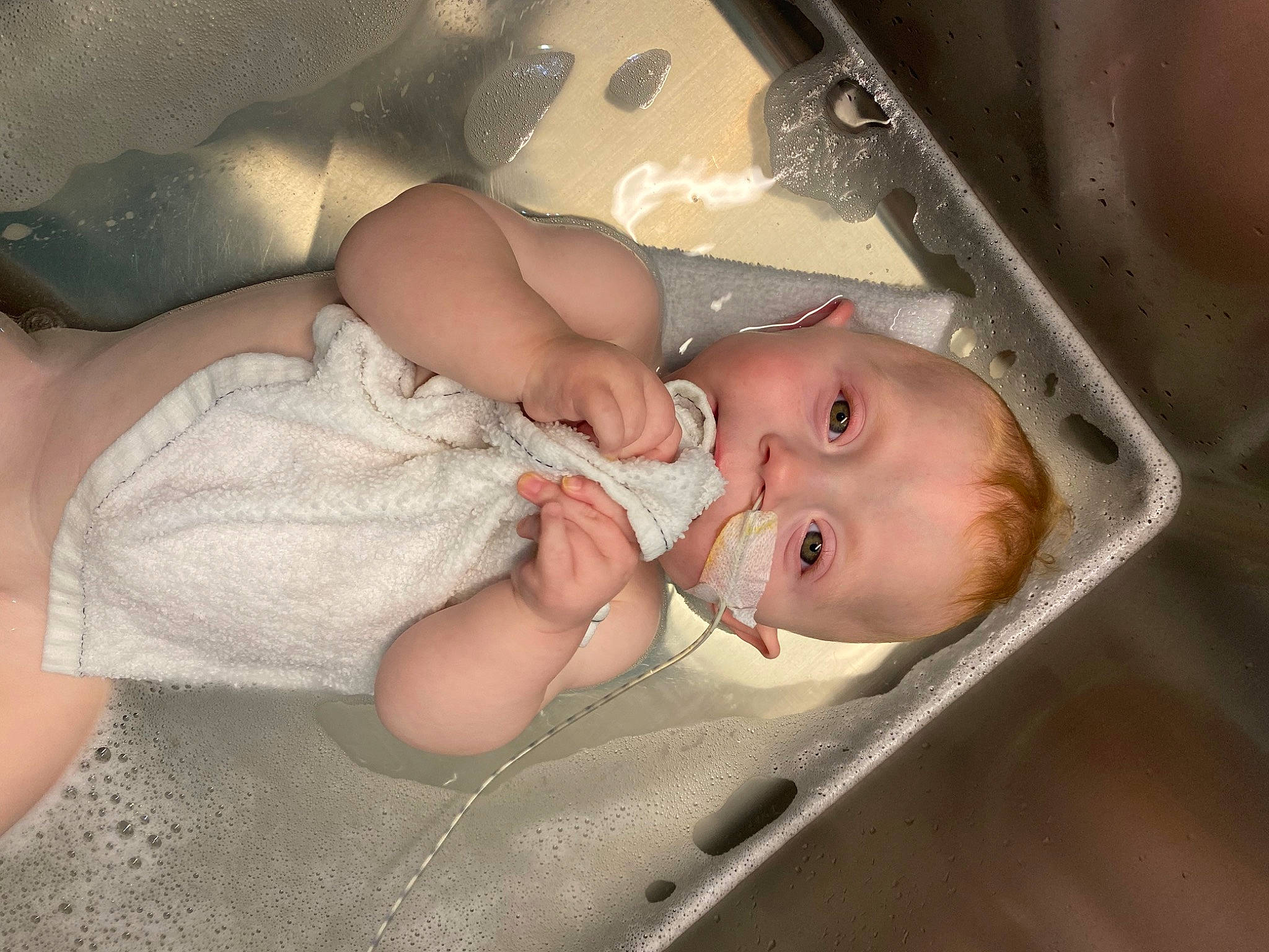 Marley is registered to the contest to win money with this photo: baby, baby_products, baby_safety, baby_toddler_clothing, bathing, cheek, chest, child, comfort, eyelash, gesture, human_body, linens, nail, person, skin, sleep, thumb, toddler