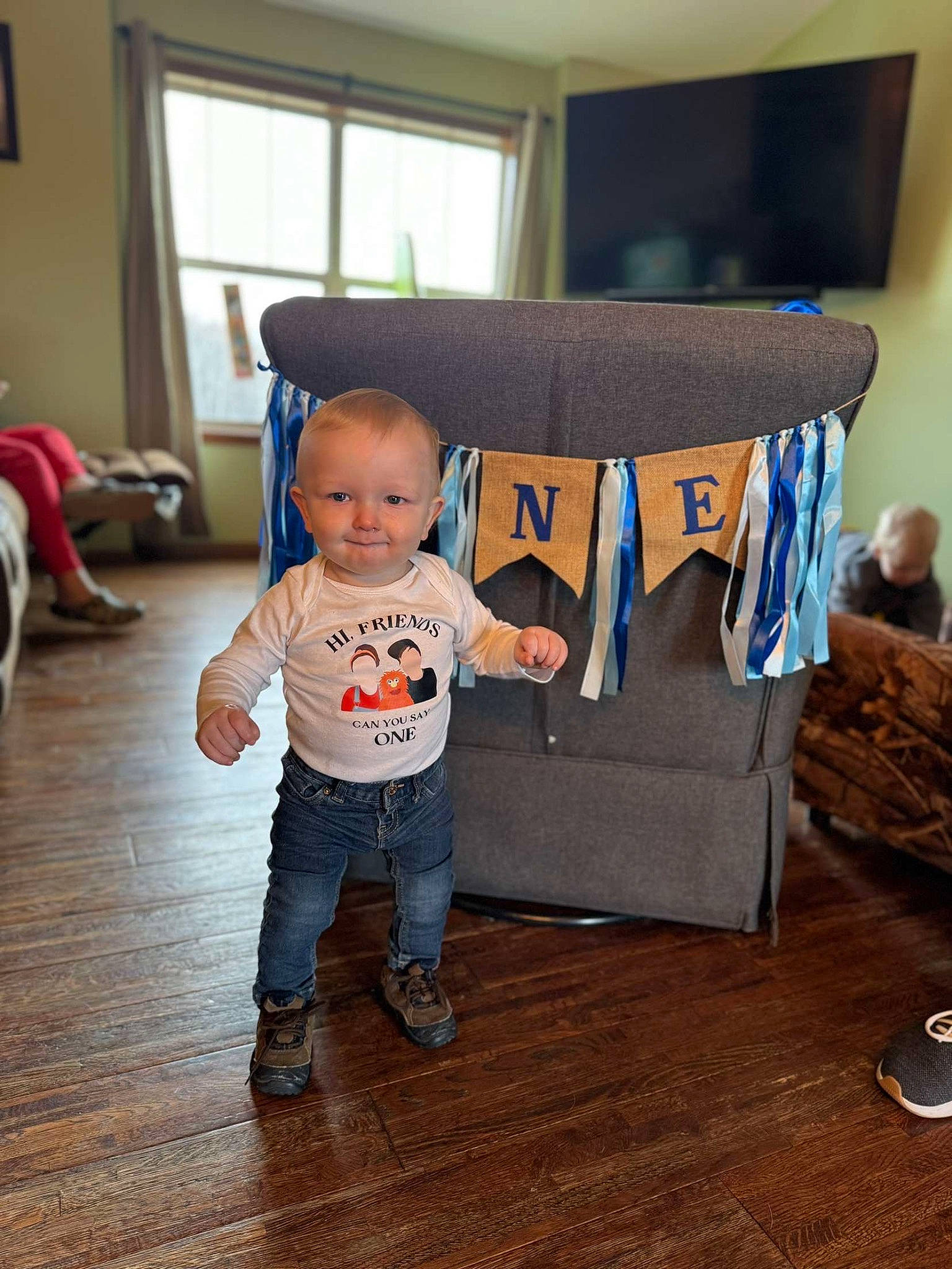 Grayson joined the competition — help win amazing prizes! baby, baby_toddler_clothing, child, comfort, couch, floor, flooring, fun, hardwood, laminate_flooring, living_room, person, pillow, room, sitting, smile, throw_pillow, toddler, window, wood