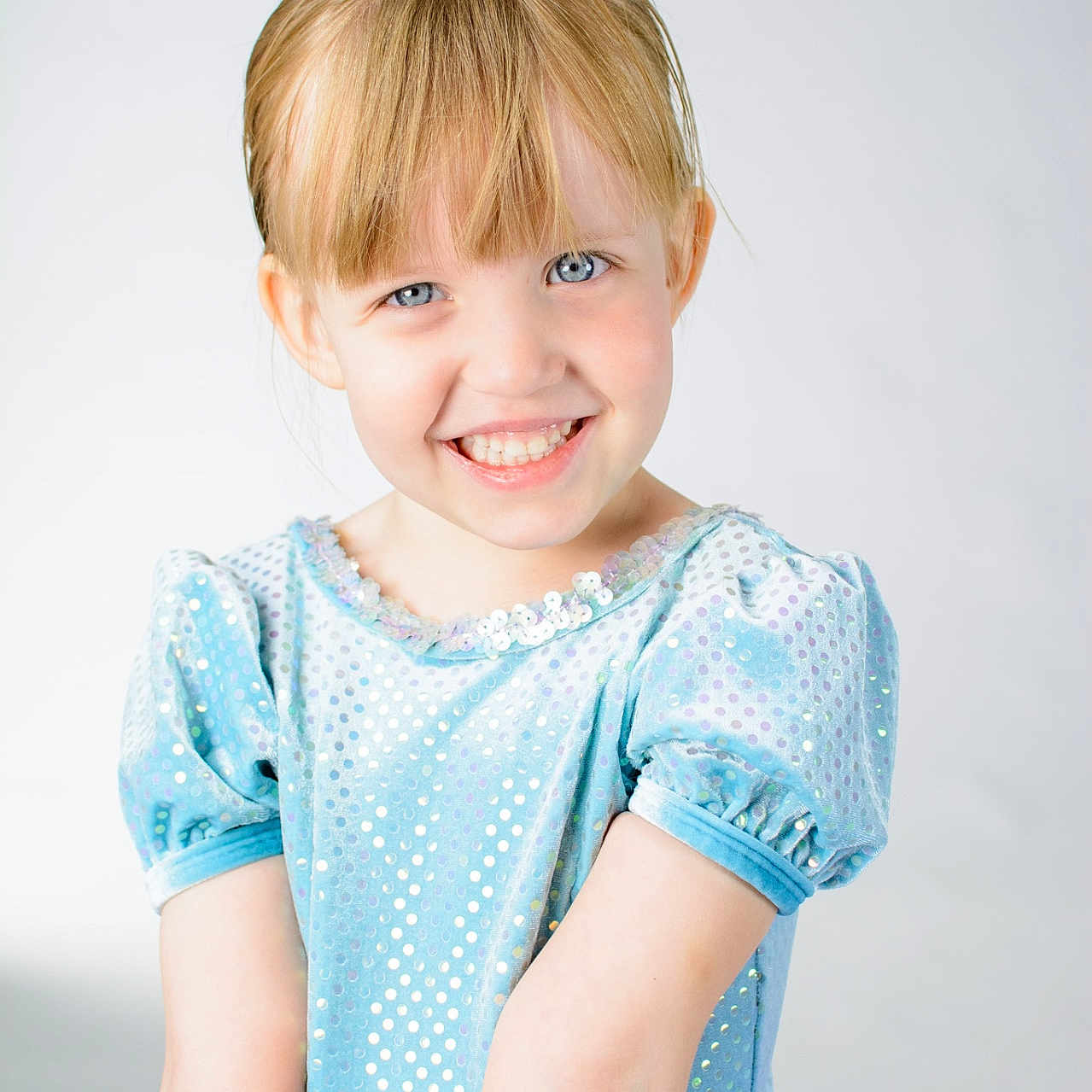Cloetta is registered to the contest to win money with this photo: blonde_hair, blue_dress, child, childhood, costume, cute, dance, face, fashion, girl, happy, innocence, portrait, posing, puffy_sleeves, smile, sparkles, studio, tutu, young