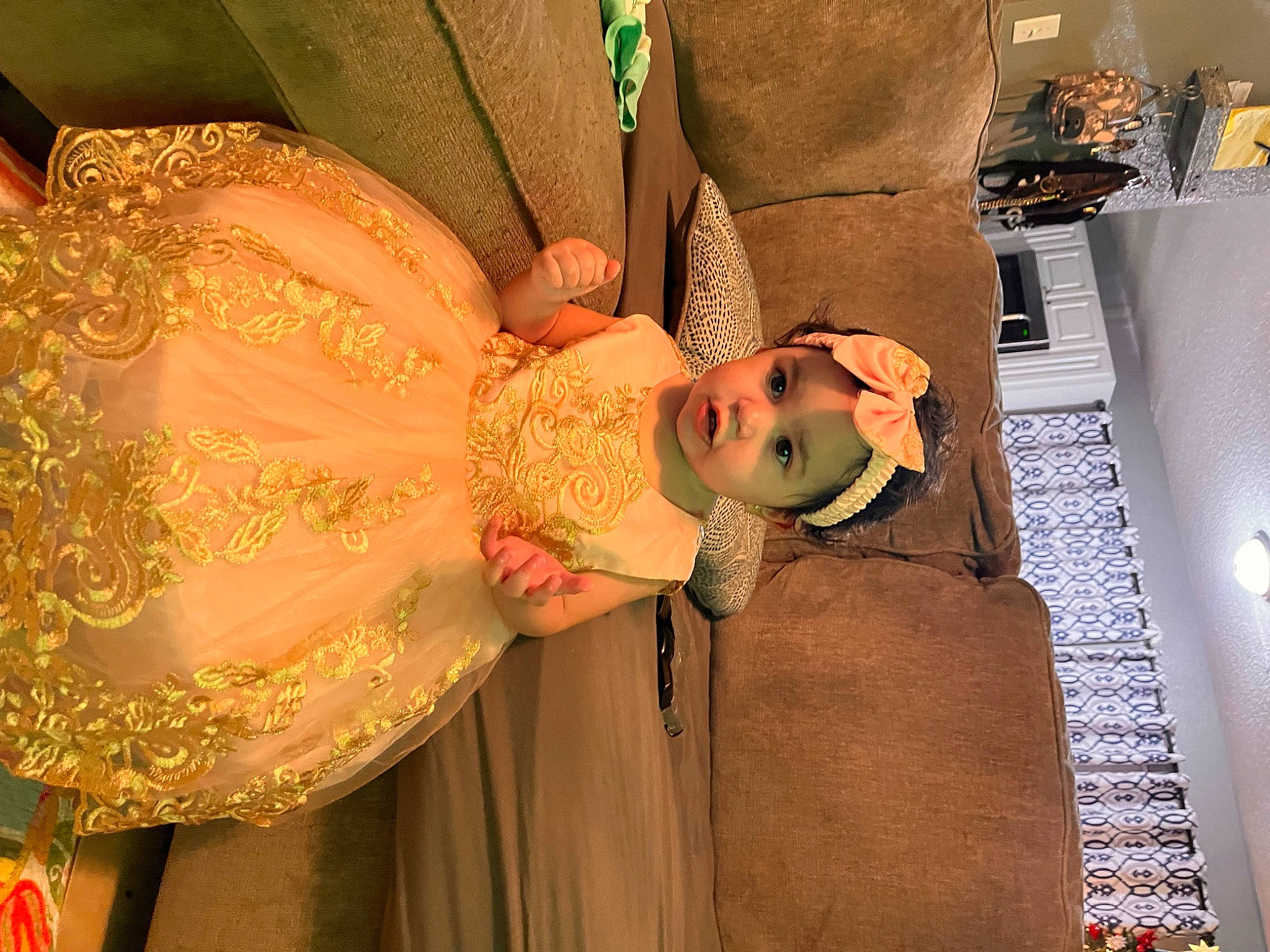 Jazelle is registered to the contest to win money with this photo: bridal_accessory, bridal_clothing, costume, doll, dress, event, fashion_accessory, fashion_design, formal_wear, happy, headpiece, headwear, jewellery, pattern, peach, person, pink, room, textile, toy