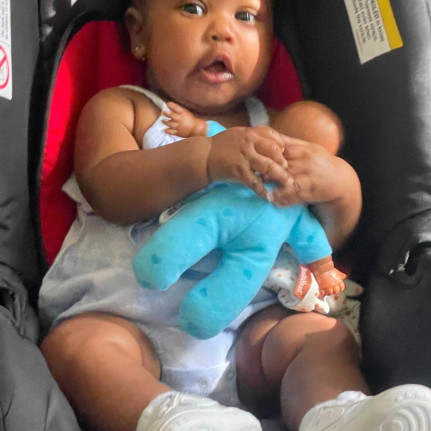 Jasiah is registered to the contest to win money with this photo: baby, bodypart, clothing, cushion, face, finger, footwear, furniture, glove, hand, head, homedecor, newborn, person, photography, portrait, shoe, shorts, sitting, toy