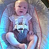 Margaret Hamilton is registered to the contest to win money with this photo: baby, baby_seat, buckle, candid, carpet, chair, child, cute, face, foot, furniture, harness, indoor, infant, legs, onesie, patterned_fabric, plush, portrait, smile