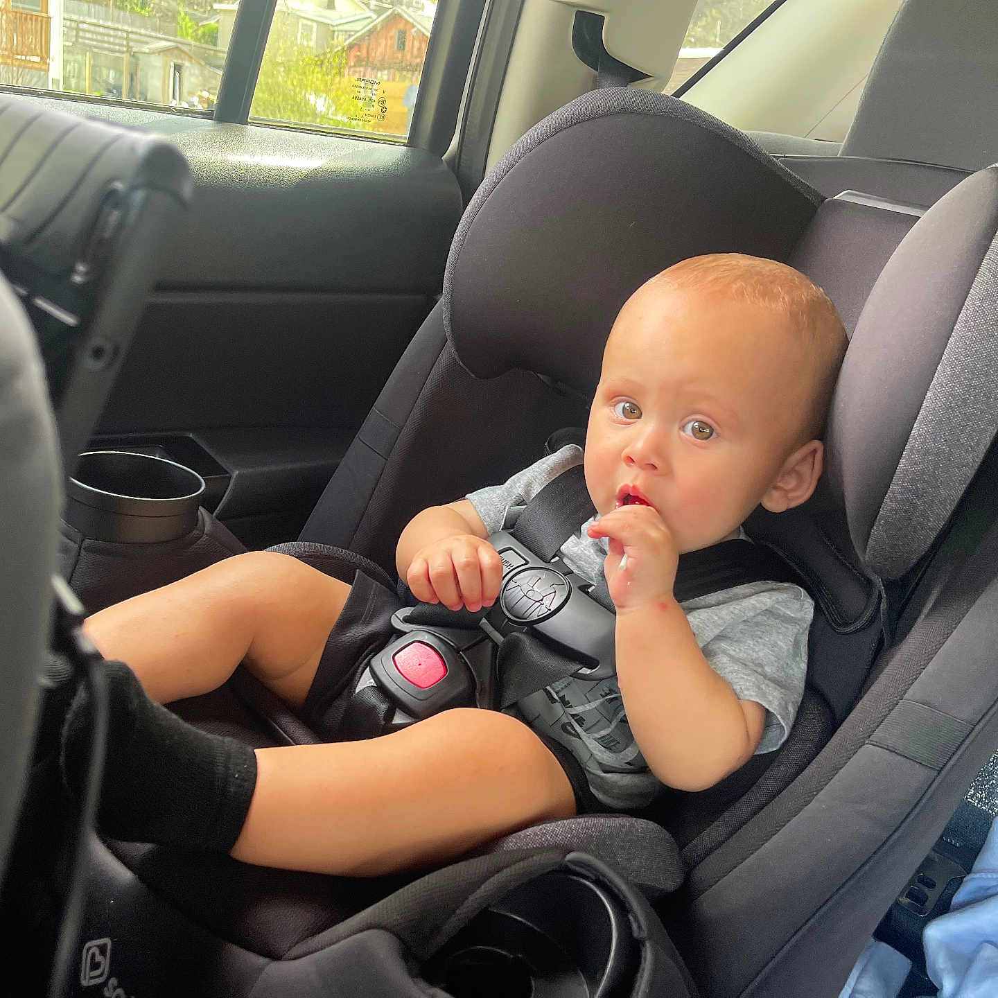 John is registered to the contest to win money with this photo: accessories, baby, car, car_interior, carseat, chair, clothing, cushion, face, furniture, glove, head, homedecor, jewelry, person, photography, portrait, ring, transportation, vehicle