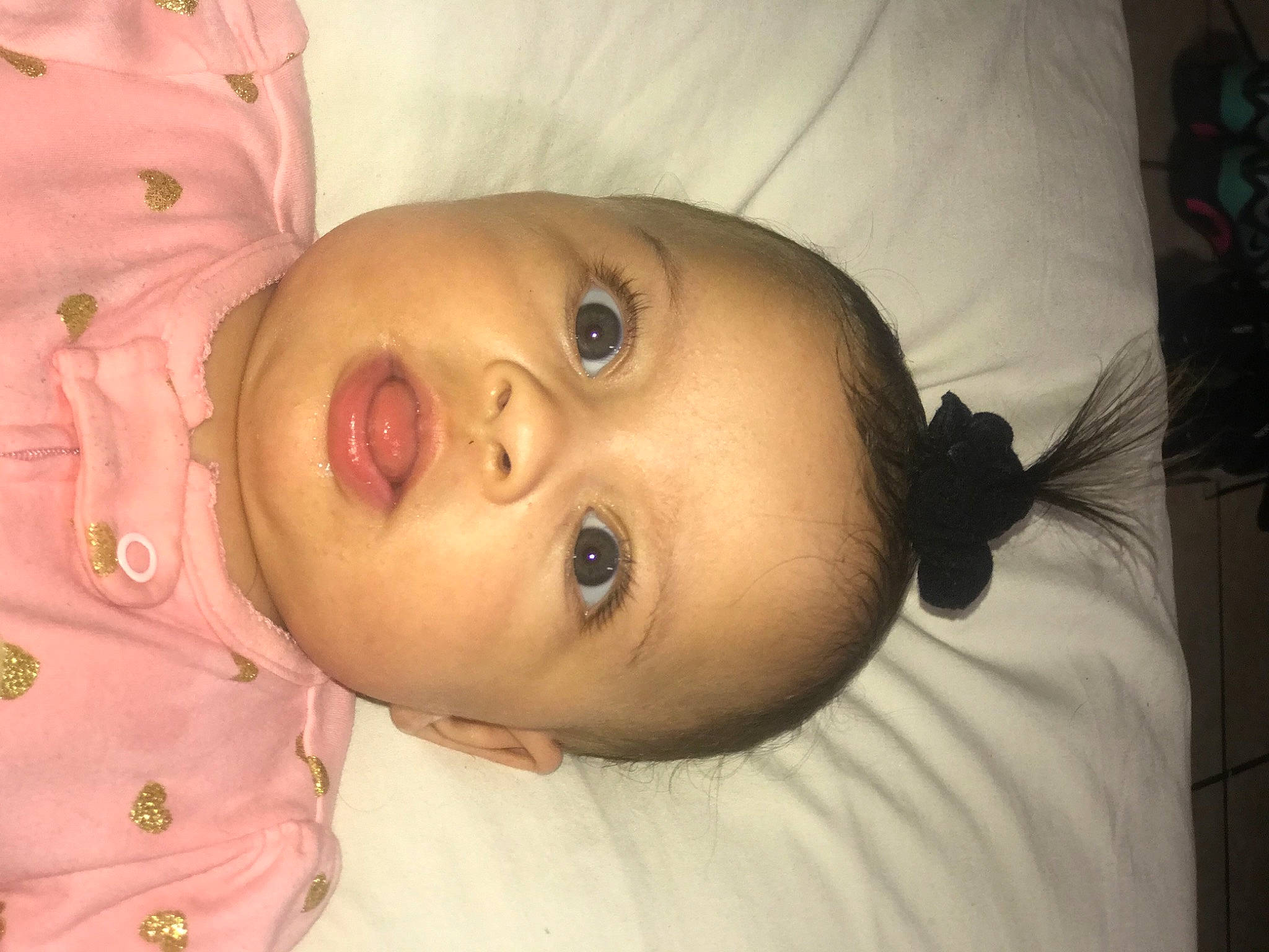 Emerie joined the competition — help win amazing prizes! baby_toddler_clothing, cheek, chin, ear, eye, eyebrow, eyelash, face, forehead, hair, head, human_body, iris, lip, mammal, mouth, nose, person, skin, smile