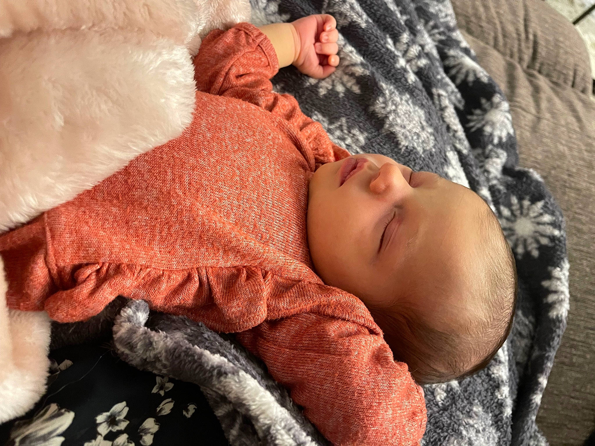 Bailiee is registered to the contest to win money with this photo: baby, baby_sleeping, baby_toddler_clothing, bedding, bedtime, child, comfort, fur, headgear, knit_cap, linens, nap, nose, pattern, person, skin, textile, toddler, tree, wood