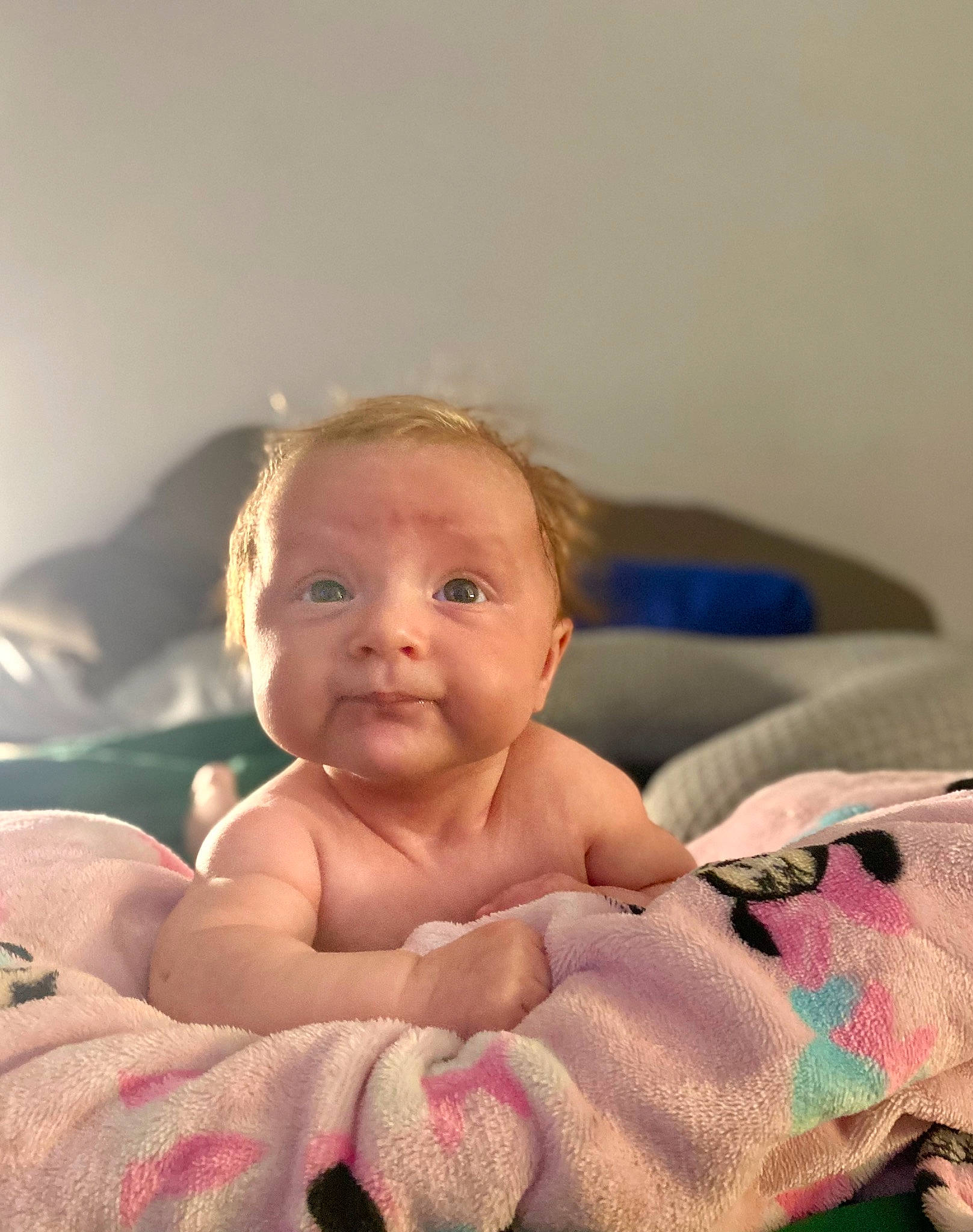 Amira is registered to the contest to win money with this photo: arm, baby, baby_toddler_clothing, cheek, chest, chin, comfort, eye, eyebrow, face, finger, head, iris, lip, mouth, nose, person, skin, smile, stomach