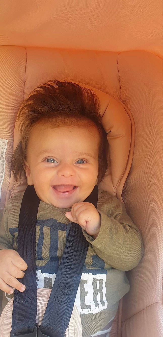 Filip is registered to the contest to win money with this photo: brown_hair, cheek, child, chin, eye, face, facial_expression, finger, forehead, gesture, hair, head, joy, lip, mouth, nose, person, skin, smile, thumb