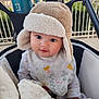 Lucy is registered to the contest to win money with this photo: baby, child, hat, bib, blanket, stroller, outdoor, cute, face, smile, clothing, portrait, infant, cozy, warm, person, curious, headwear, babywear, babyaccessory