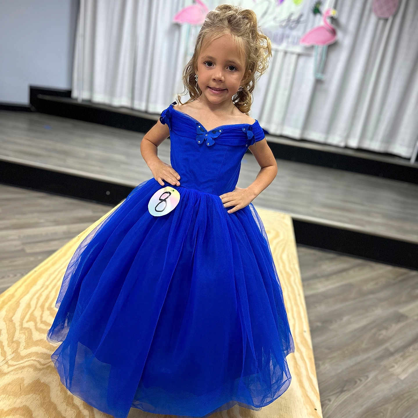 Madilynn is registered to the contest to win money with this photo: child, clothing, costume, dress, eveningdress, face, fashion, female, formalwear, girl, gown, hardwood, head, lady, person, photography, plywood, portrait, sleeve, wood