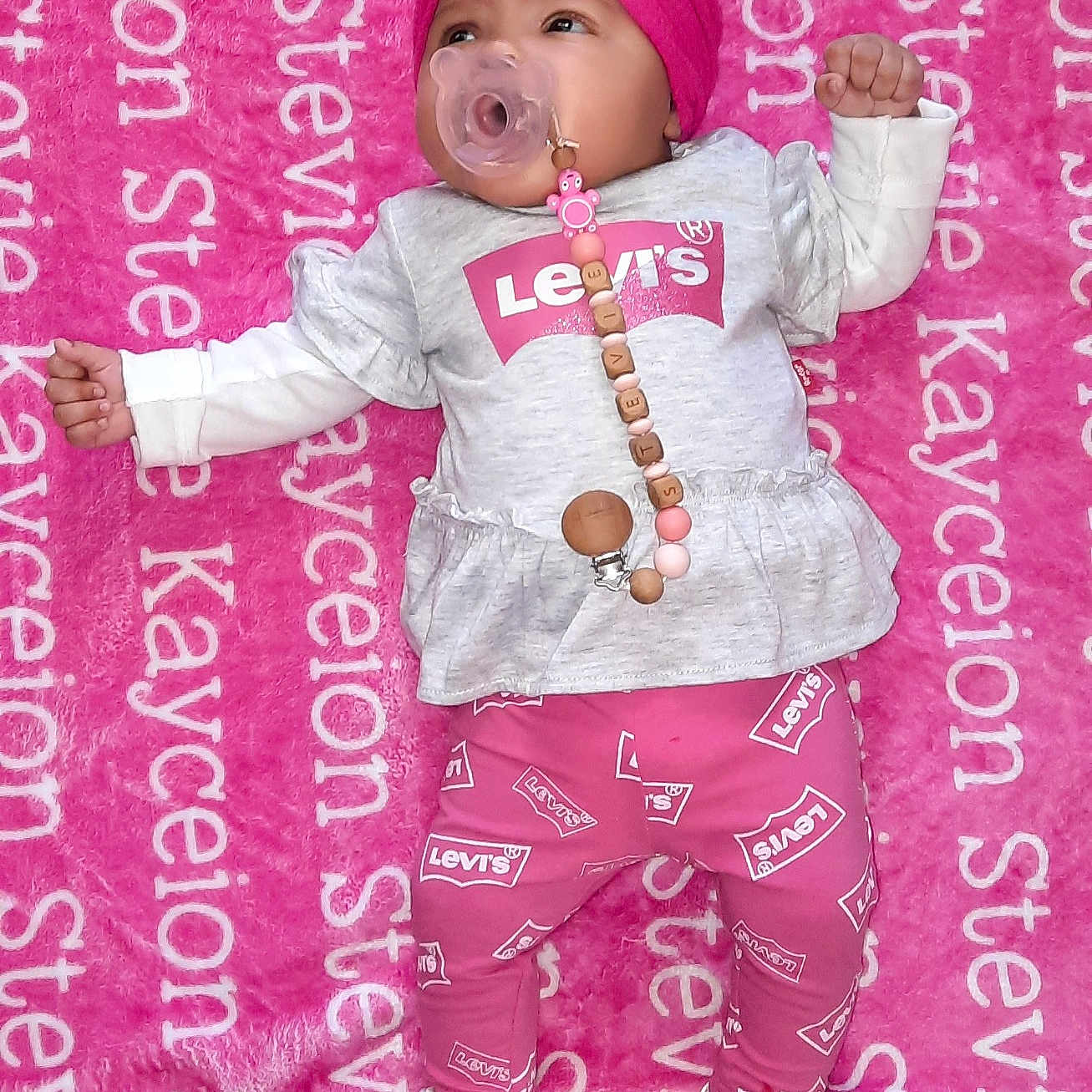 Stevie joined the competition — help win amazing prizes! baby, baby_toddler_clothing, child, design, font, happy, magenta, pattern, pink, publication, purple, red, sleeve, textile, toddler